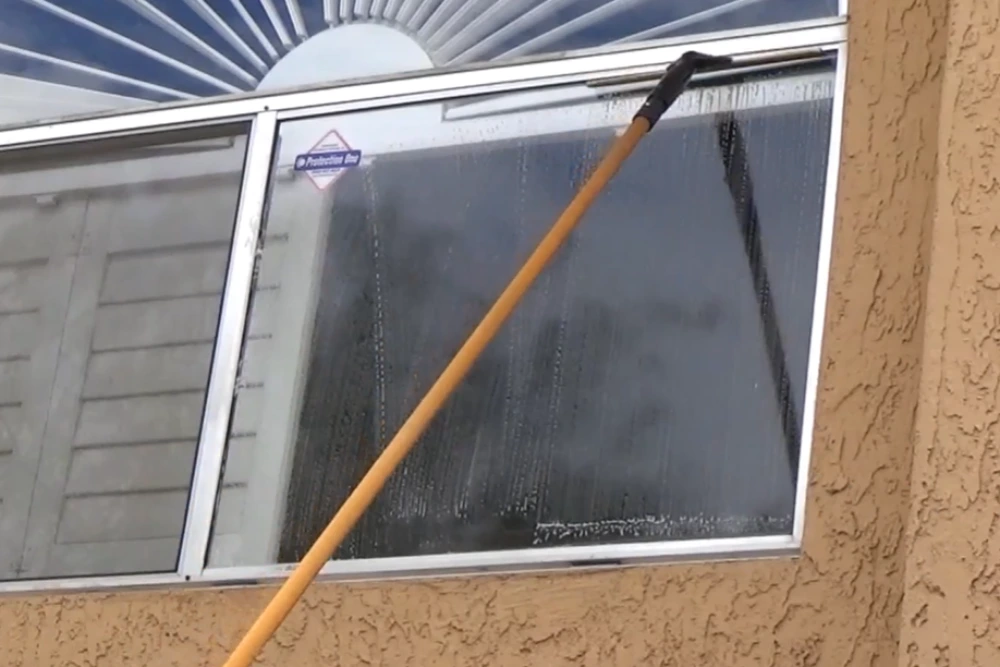 Window cleaning process San Clemente CA β technician cleaning residential glass
